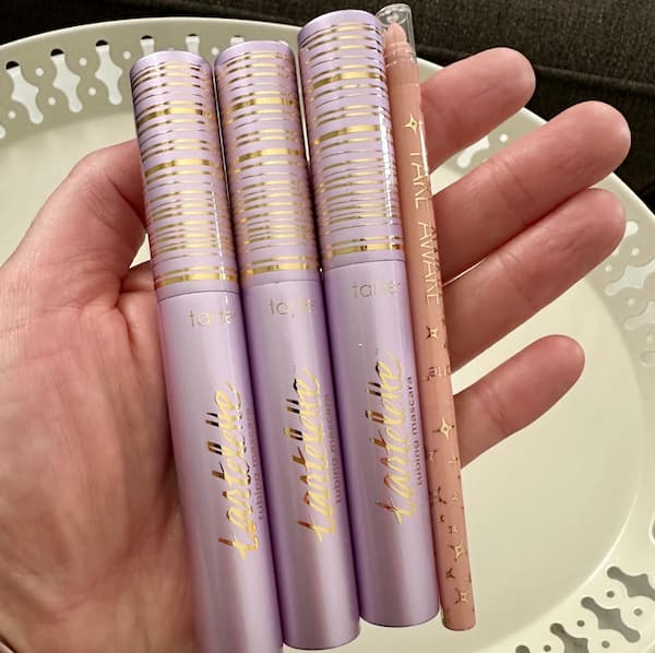 Tarte Tartelette Lash Extension Tubing Mascara 3-Pack and Eyeliner Set in hand